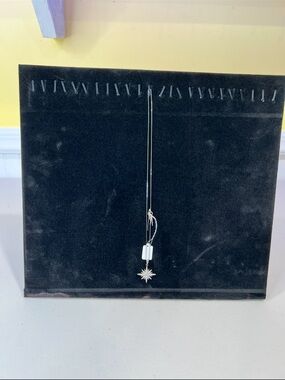 Necklace display stand. Holds 24 necklaces
